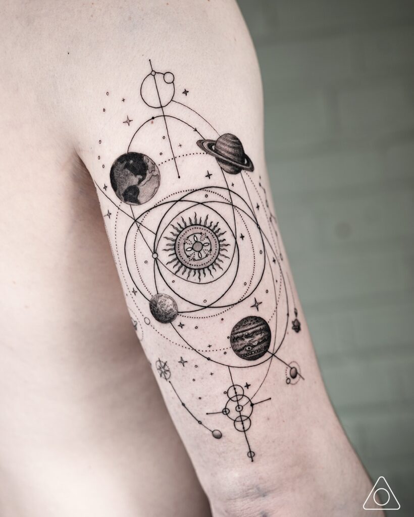 Geometric planet space tattoo built from circles, arcs and clean straight lines