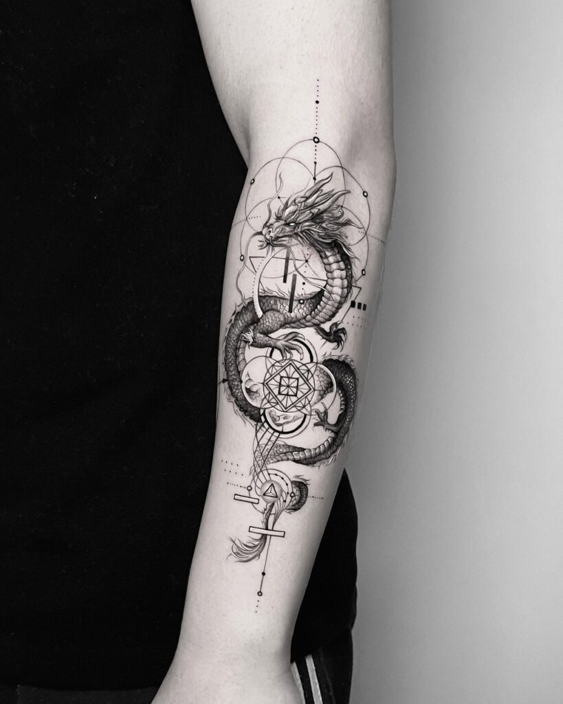 Geometric dragon tattoo for women built from angular blackwork shapes and clean symmetry