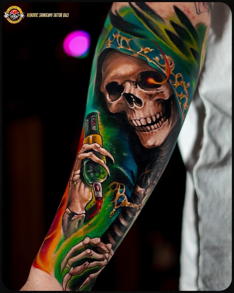 Day of the Dead colorful sleeve tattoo featuring a decorated sugar skull and orange marigolds.