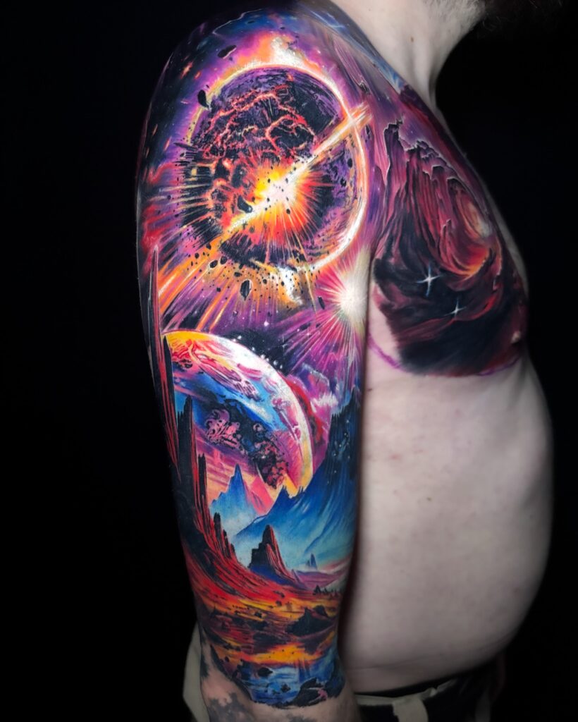 Space and cosmos colorful sleeve tattoo with nebula purples, blues and scattered stars.