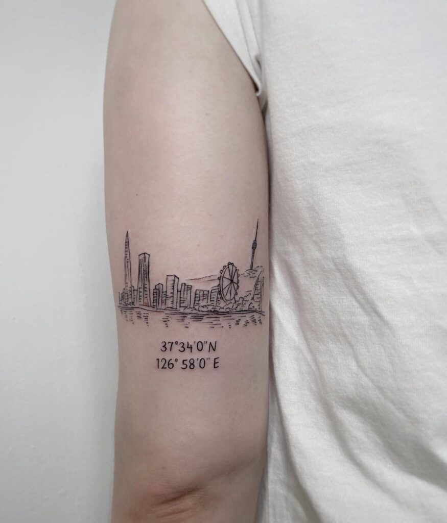 Coordinate tattoo built into a larger composition alongside a compass and linework design