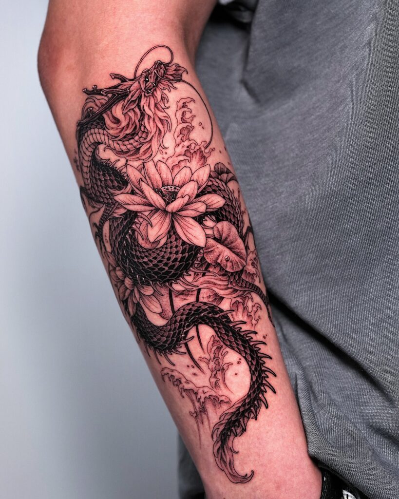Dragon and lotus tattoo for women combining a serpentine body with an open lotus flower