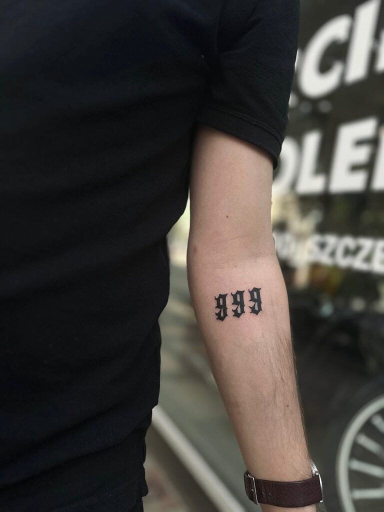 Number tattoo for men in bold type, a private small meaningful tattoo design