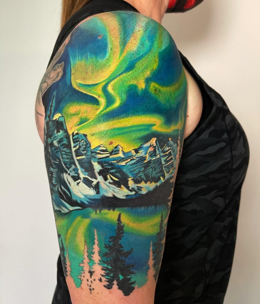 Aurora borealis space tattoo with flowing ribbons of green and violet light